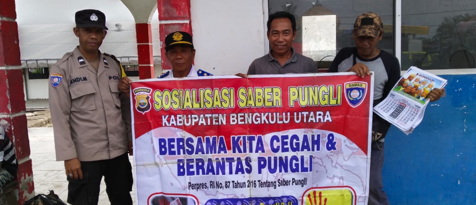 Bhabinkamtibmas Sosialisasi Saber pungli Bersama Warga