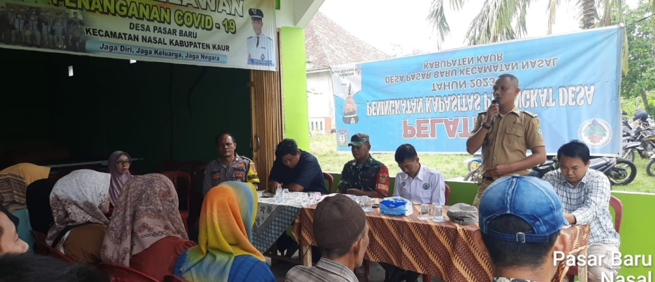 Bhabinkamtibmas Menghadiri MusDes Penyusunan RKPDesa Tahun 2024 di Desa Pasar Baru 